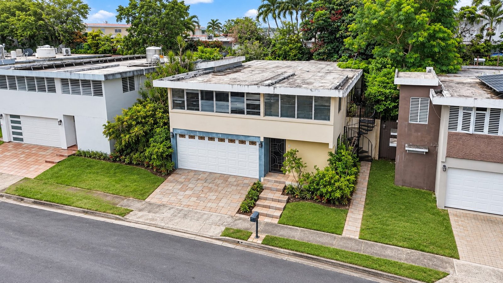 Aerial view of a home in Colinas de Monte Carlo, San Juan, Puerto Rico